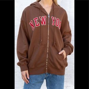 Brandy Melville | Tops | Brandy Melville Oversized Brown Christy New York  Hoodie | Poshmark